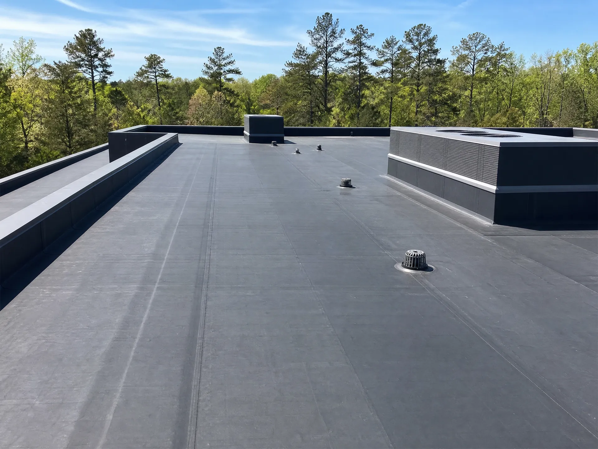 EPDM membrane on a North Carolina low-slope commercial roof with seam and drain details