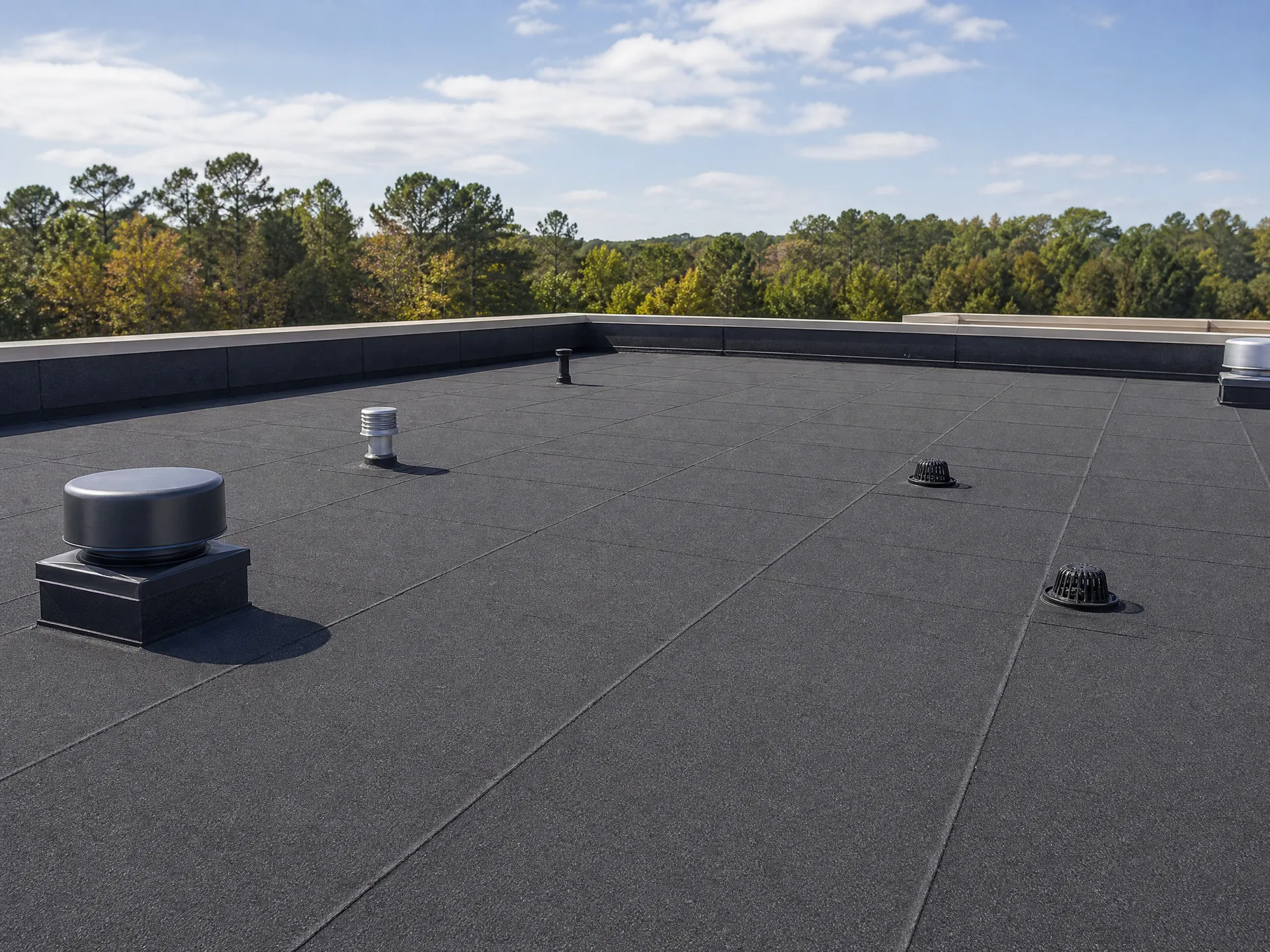 Modified bitumen roofing surface on a North Carolina commercial low-slope roof